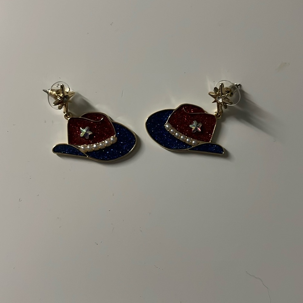 Cow boy earrings never worn
